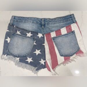 Distressed Mossimo supply Co. women’s high rise jean flag shorts- size 10